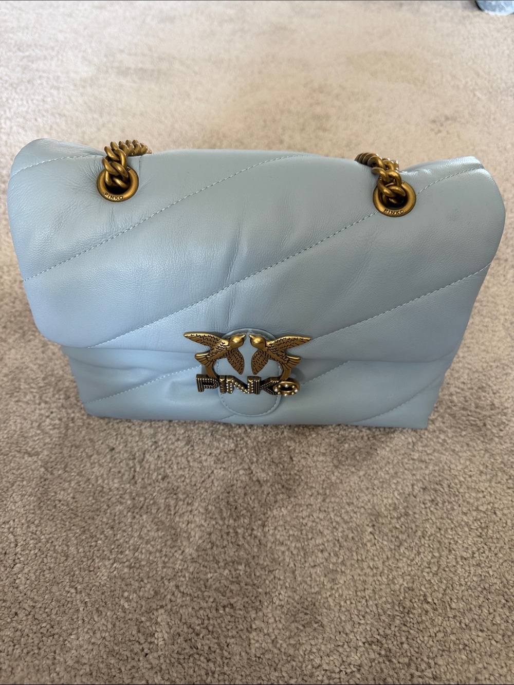 Pinko light blue quilted leather shoulder bag with gold bird clasp
